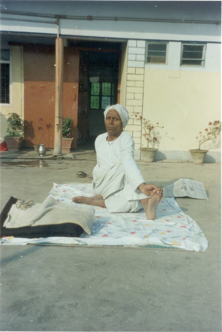Dr H N Roy practicing yoga in the morning, representing healthy routine and wellbeing.
